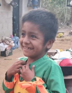 Child receiving christmas gift